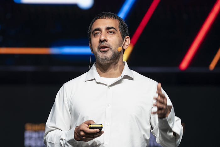 Balaji Srinivisan giving a conference talk